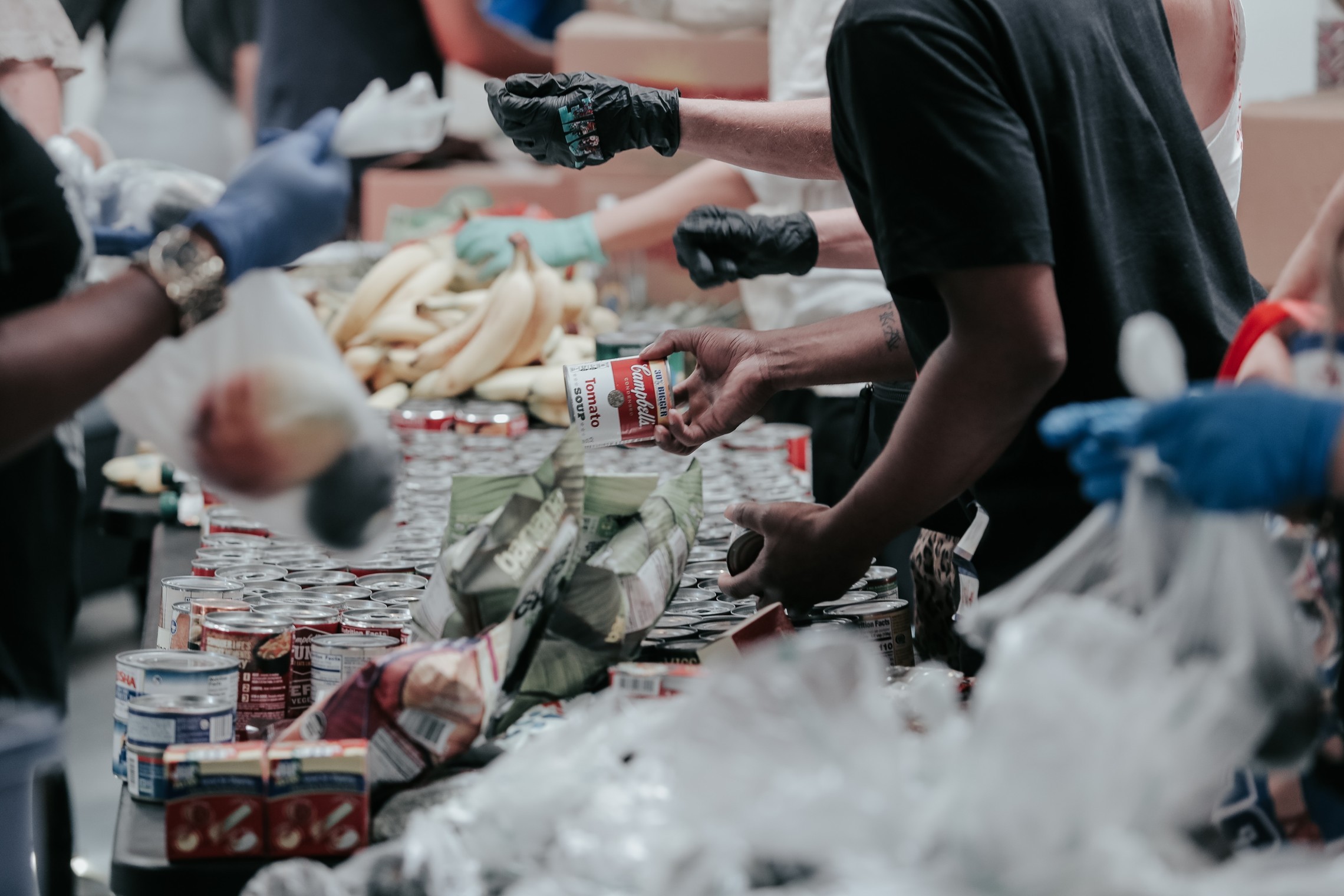 volunteers distribute food