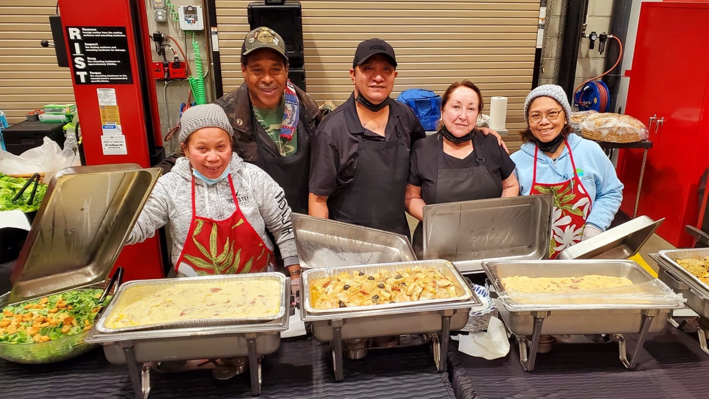 Ronnie and Team serving Thanksgiving dinner at Costco