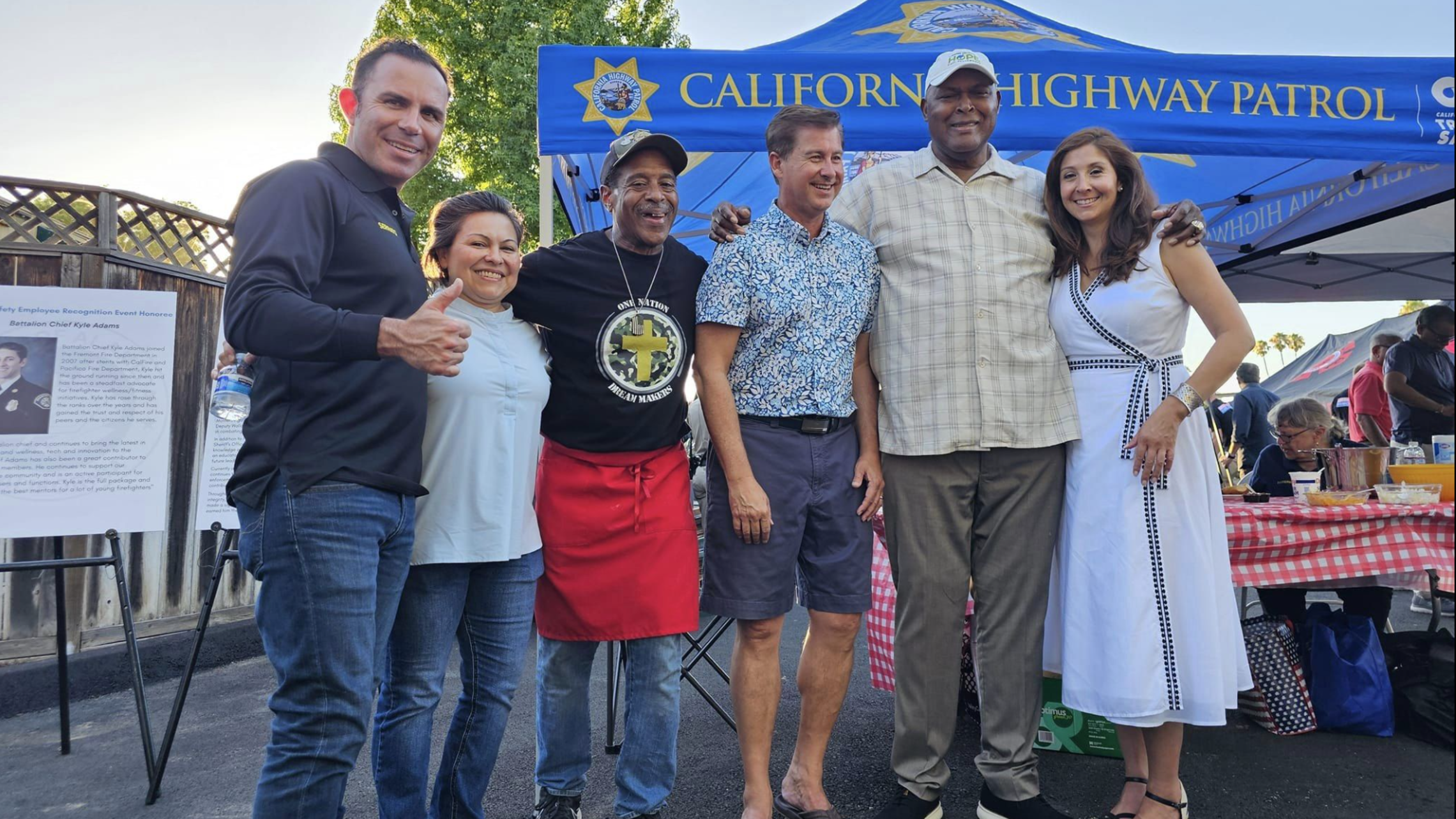 Community members gather for District 1 BBQ group-standing-for-photo-at-bbq